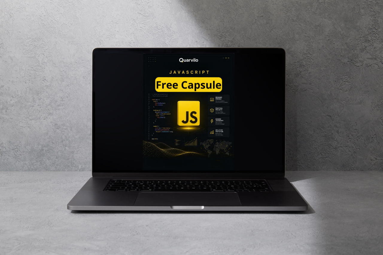 Laptop displaying a Quarkvilo JavaScript free capsule on a gray background